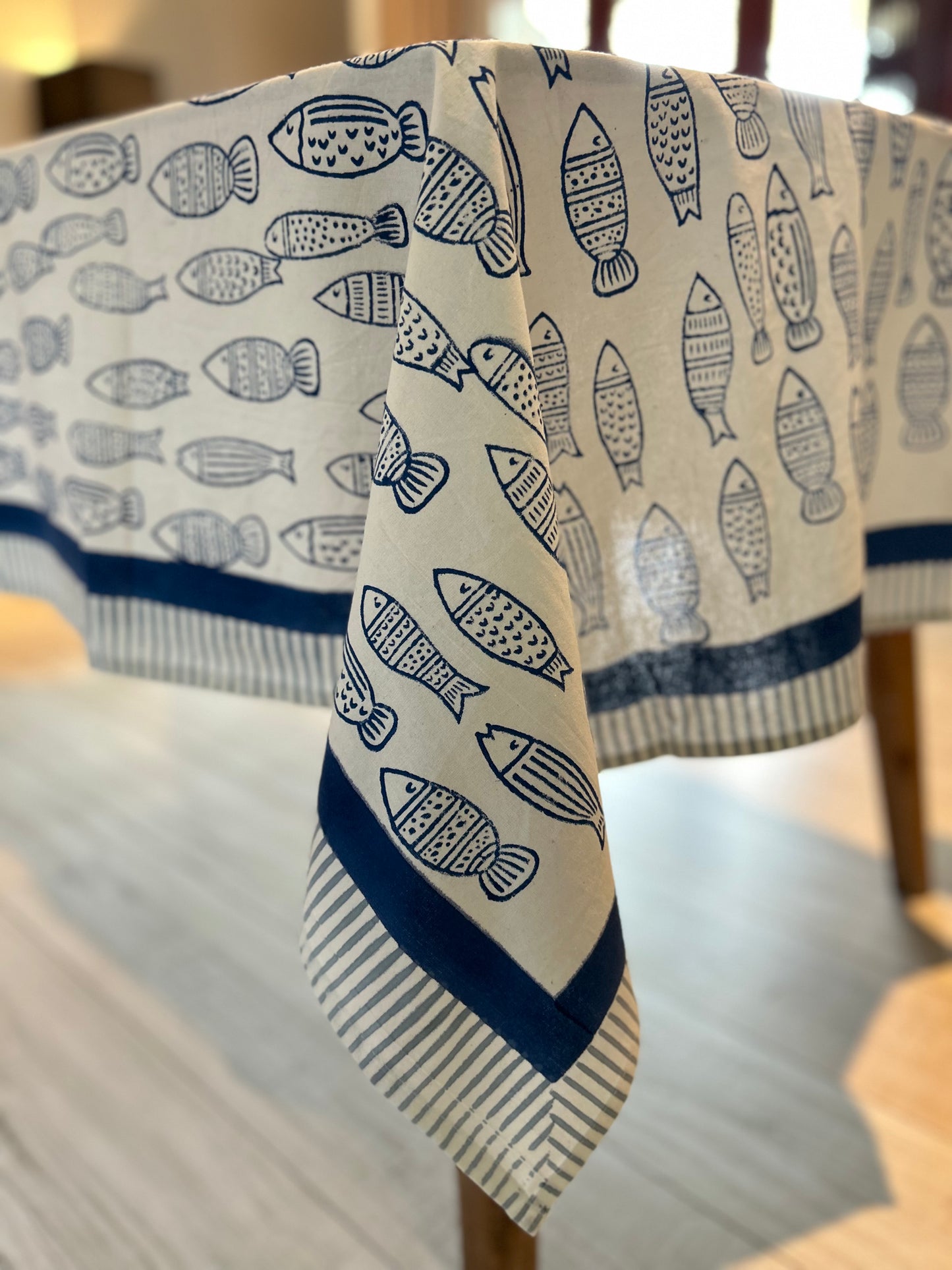 Blue and white stylised fish block printed table cloth