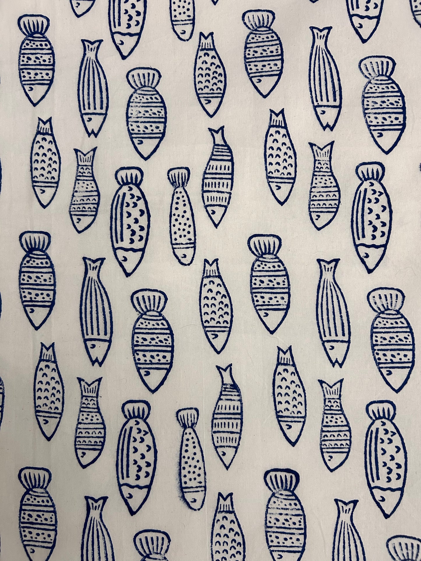 Blue and white stylised fish block printed table cloth